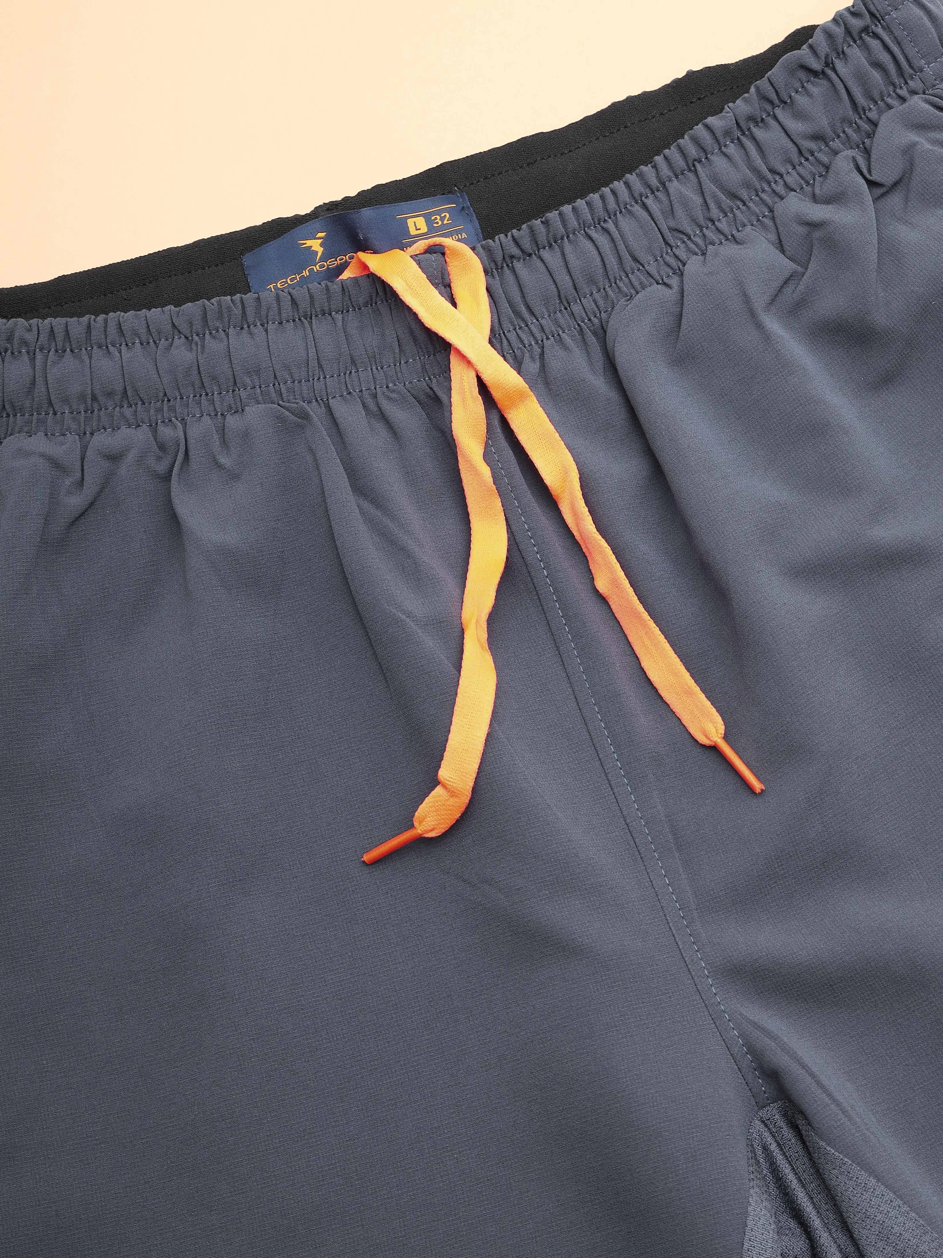 Men Solid Slim Fit Shorts with TECHNOLITE