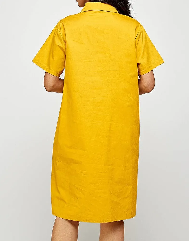 One Size Short sleeve shirt dress with unique contrast pockets. relaxed fit